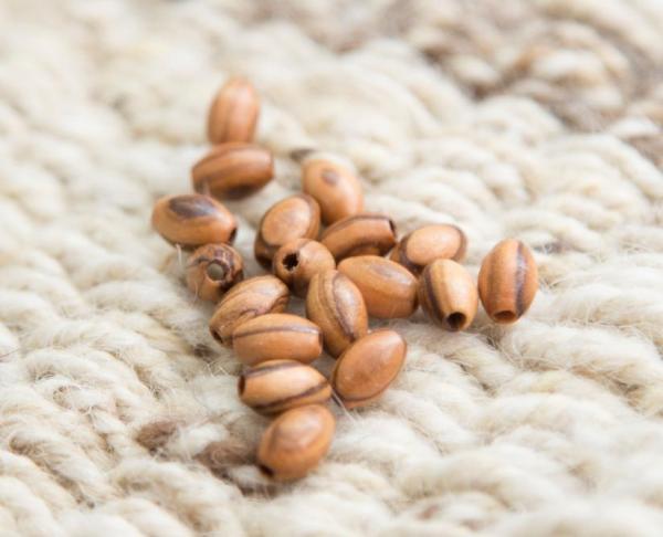 Oval beads - M.O.Q. 5000 - Size: 8mm