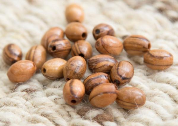 Oval beads - M.O.Q. 3000 - Size: 13mm