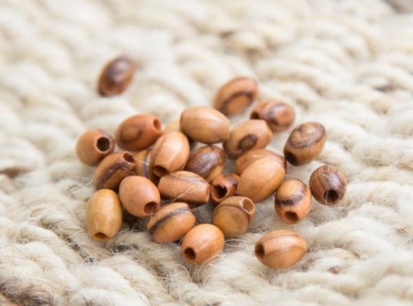 Oval beads - M.O.Q. 5000 - Size: 9mm