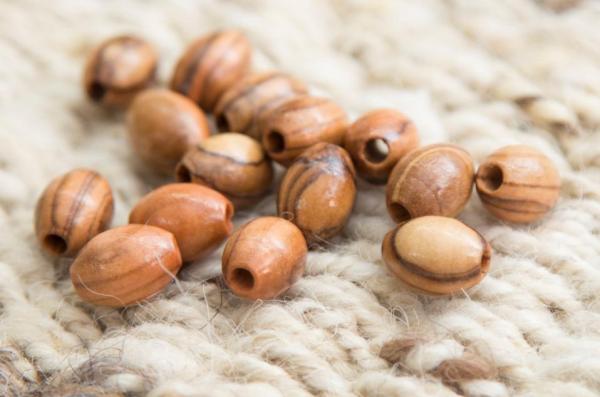 Oval beads - M.O.Q. 3000 - Size: 12mm